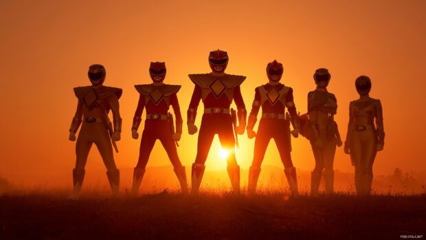 Classic Power Rangers wallpapers with each ranger standing heroically against a bright sunset.