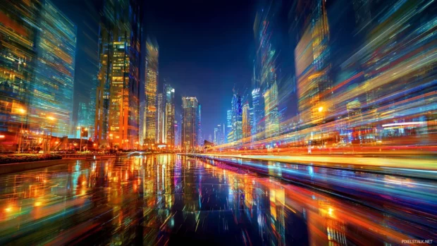 Colorful beautiful backgrounds for PC capturing the lively essence of a bustling city at night with dazzling lights and dynamic energy.