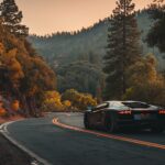Cool laptop wallpapers displaying a sleek sports car on a windin