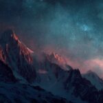 Cool laptop wallpapers portraying majestic mountains under a sta