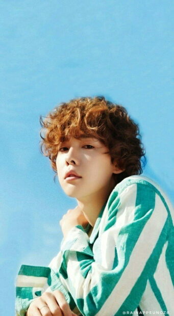 Curly Haired Jinu in Striped Shirt Wallpaper.