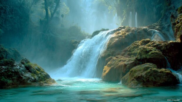 Enchanting waterfall wallpaper that captures the essence of nature.