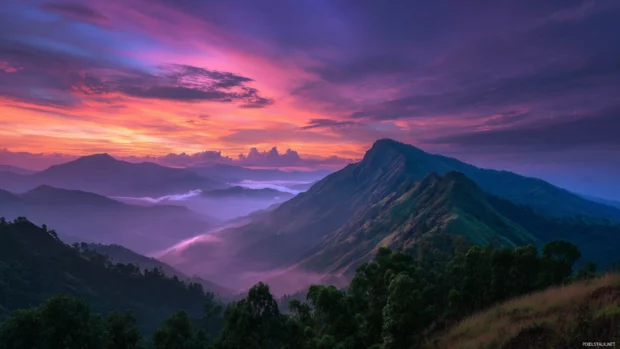 Free HD Wallpaper Background for Desktop featuring a serene mountain landscape at sunrise with vibrant colors and soft clouds.