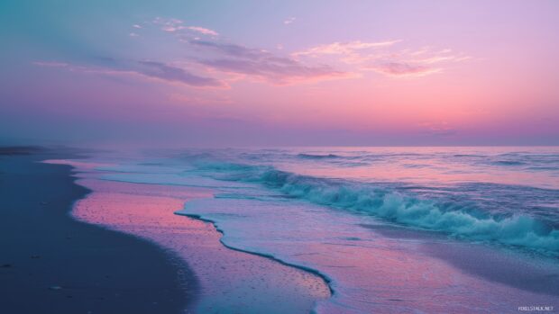 Hd wallpaper for computer, A serene beach with gentle waves and a pastel sky at dawn.