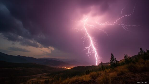 High Definition Lightning Desktop Wallpaper, A stunning high resolution lightning storm captured in the night sky illuminating the landscape below.