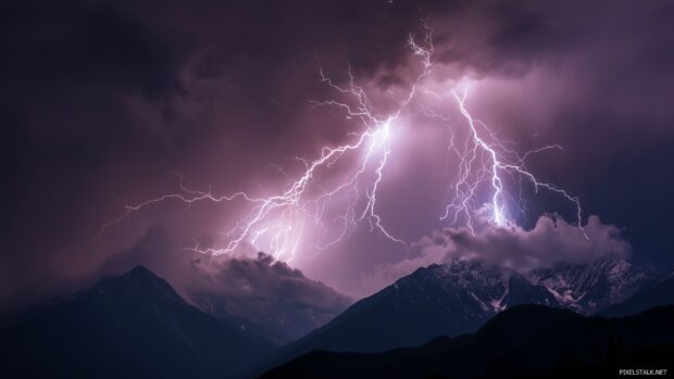 High Definition Lightning Desktop Wallpaper, An intense depiction of a lightning storm raging over a dramatic mountain range.