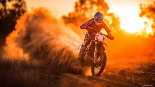 High resolution dirt bike wallpapers free capturing the excitement of a race in the sunset.