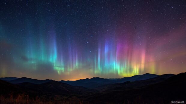 High resolution starry night wallpapers hd highlighting a breathtaking aurora borealis under a clear night sky.