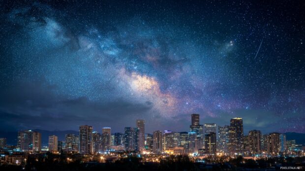 High resolution starry night wallpapers hd showcasing a vibrant city skyline under a starry sky.