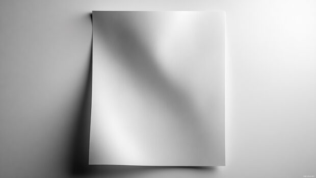 Simple white blank wallpaper providing an uncluttered and classic background for your digital workspace  .