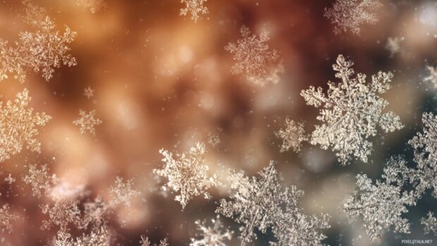 Snowflake wallpaper hd for Christmas, filled with sparkling snowflakes against a warm background.