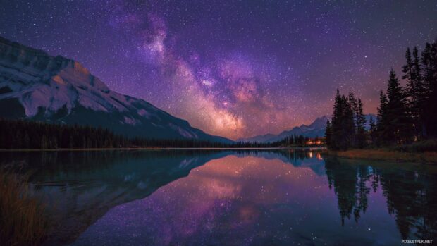 Starry night wallpapers hd featuring a tranquil lake reflecting the twinkling stars above.