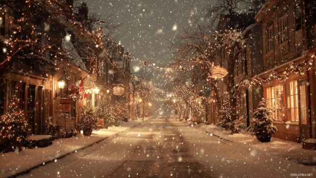 Stunning Christmas snow wallpapers HD capturing a cozy street scene with twinkling lights and gently falling snowflakes.