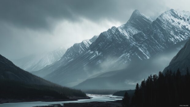 1440p majestic mountains images, Scenic view of towering peaks shrouded in mist with a winding river below.
