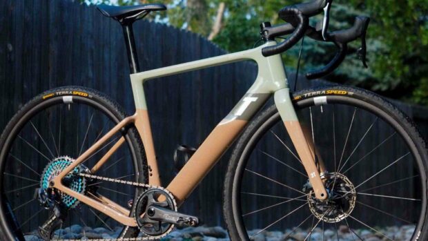 A 3T bike displays a sleek frameset with beige and gray colors in an outdoor setting, HD Desktop Wallpaper