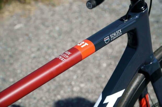 A close up of a 3T bike frame showing detailed branding and colors, 2K Mobile Wallpaper