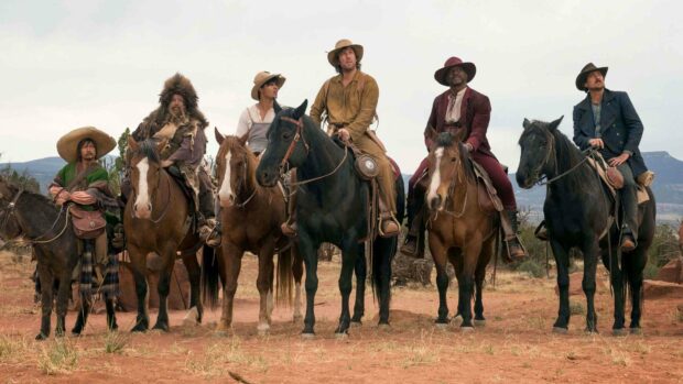 Adam Sandler and other actors dressed as cowboys riding horses in a desert setting, 4K Desktop Wallpaper