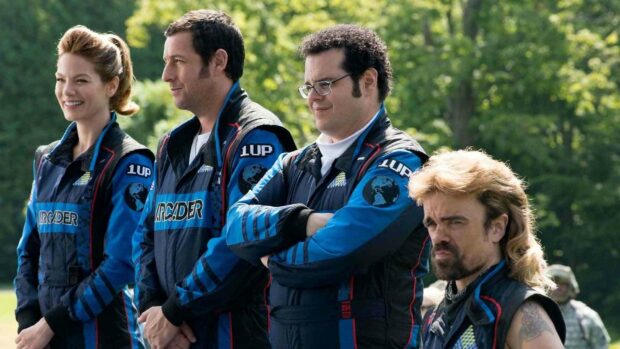 Adam Sandler and others wearing racing outfits standing outdoors with green trees in the background, HD Desktop Wallpaper