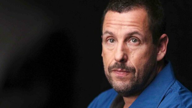 A close up portrait of Adam Sandler looking thoughtful with a dark background, HD Desktop Wallpaper