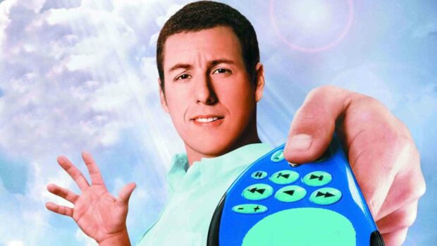 A close up of Adam Sandler holding a blue remote control with a cloudy sky background, HD Desktop Wallpaper