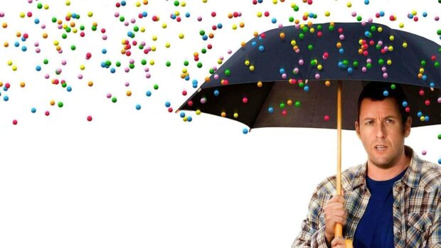 Adam Sandler holding a black umbrella while colorful balls fall around him, HD Desktop Wallpaper