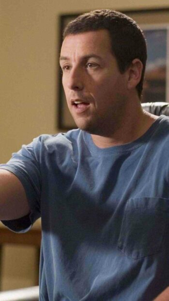 Adam Sandler in a casual blue shirt speaking indoors, HD Phone Wallpaper