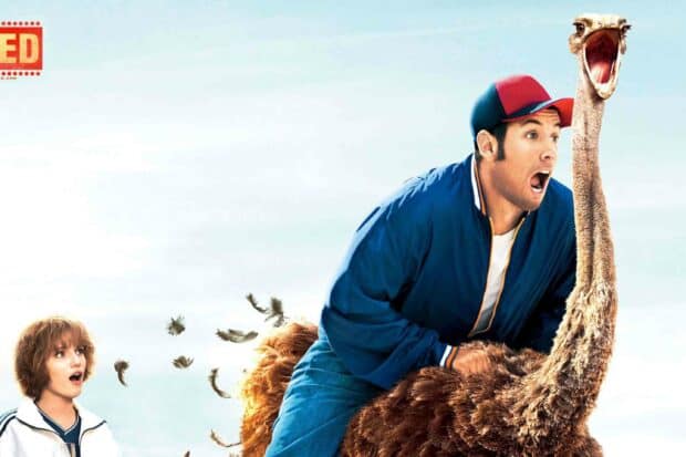 A man wearing a cap is riding an ostrich with an astonished woman watching nearby in a humorous scene related to Adam Sandler wallpapers, 2K Desktop Wallpaper