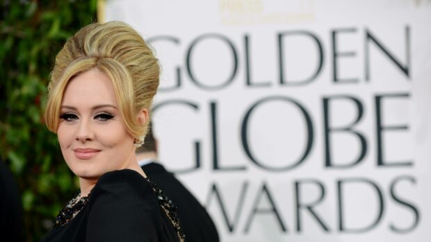 Adele is dressed elegantly at the Golden Globes event with a stylish updo hairstyle, 4K Desktop Wallpaper