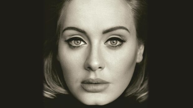 A close up portrait shows Adele with intense eyes and subtle makeup, HD Desktop Wallpaper
