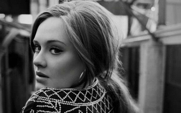 A close up portrait of Adele looking over her shoulder with intricate sequin patterns on her outfit, HD Desktop Wallpaper