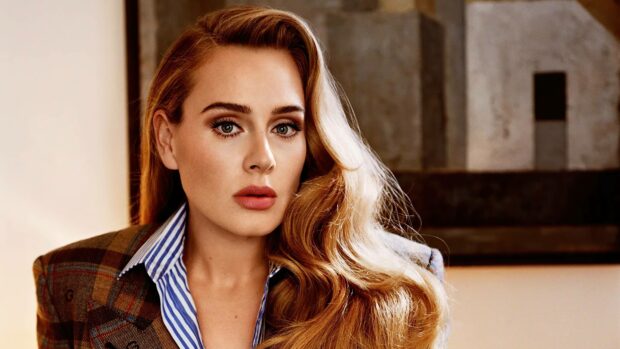Adele with long wavy hair and intense gaze, 4K Desktop Wallpaper