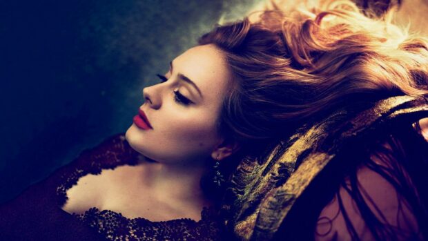 Adele Wallpapers showing a side profile of a woman lying down with flowing hair and a lace dress, HD Desktop Wallpaper
