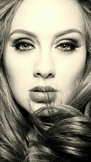 A close up of Adele with intense eyes and flowing hair in a monochrome style, HD Phone Wallpaper