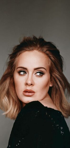A close up of Adele looking thoughtfully to the side with soft lighting, HD Phone Wallpaper