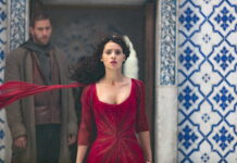 Adria Arjona Wallpapers Stunning Red Dress Scene with Blue Tile Background