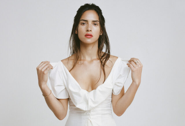 Adria Arjona in Elegant White Dress Minimalist Studio Portrait Wallpaper