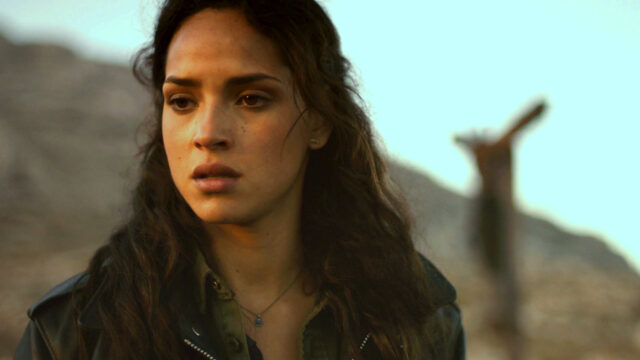 Adria Arjona intense close up in cinematic desert scene wallpaper