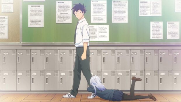 A female student clings to a male student's leg in a school hallway setting from Aharen San Wa Hakarenai