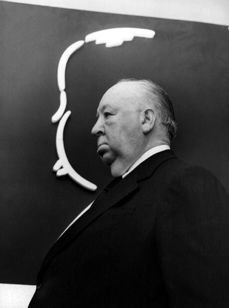 Alfred Hitchcock wallpapers showing the famous film director in a black and white profile shot, HD Desktop Wallpaper