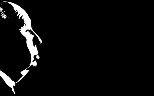 A black and white silhouette of Alfred Hitchcock in profile view on a dark background, HD Desktop Wallpaper