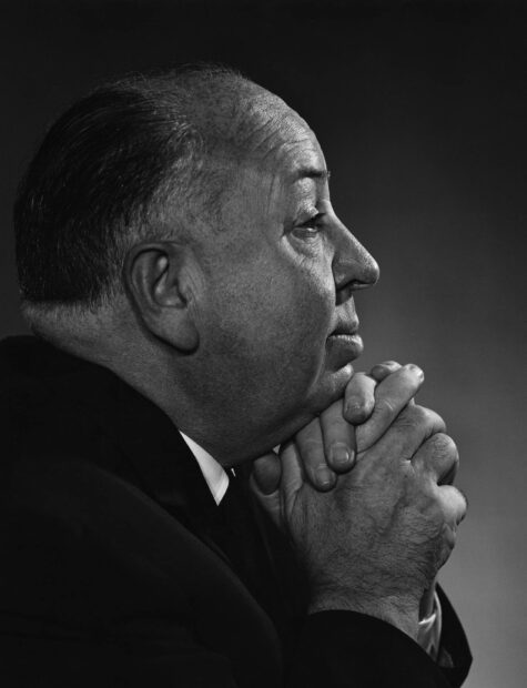 Alfred Hitchcock is shown deep in thought in this portrait, HD Phone Wallpaper
