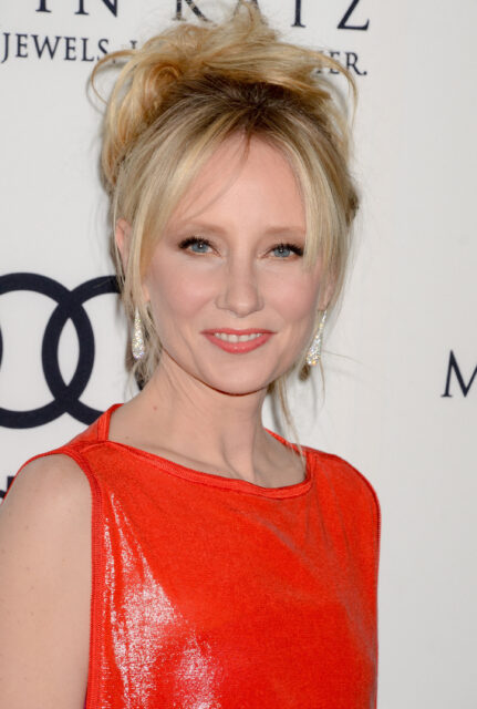 Anne Heche In Elegant Red Dress At Premiere Event