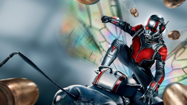 Ant Man riding a giant ant with bullets flying in action Ant Man wallpapers