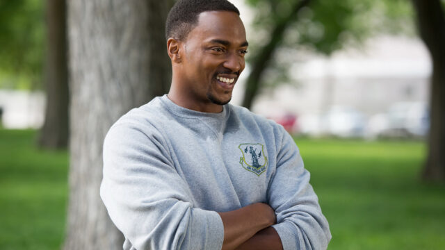Anthony Mackie Smiling In Air Force Sweatshirt Wallpaper