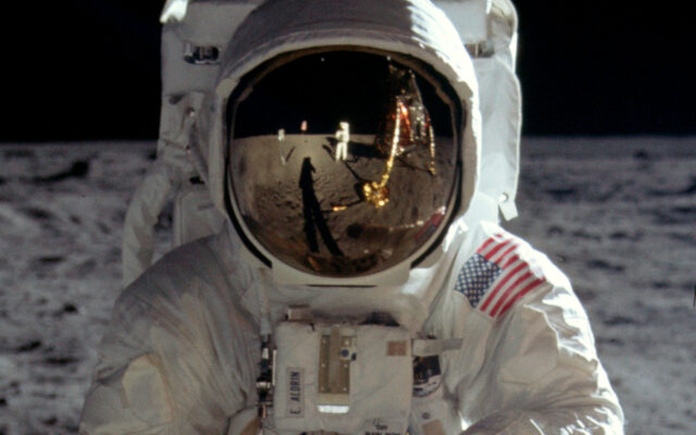 Apollo 11 Astronaut Reflection On Moon Surface Wallpaper