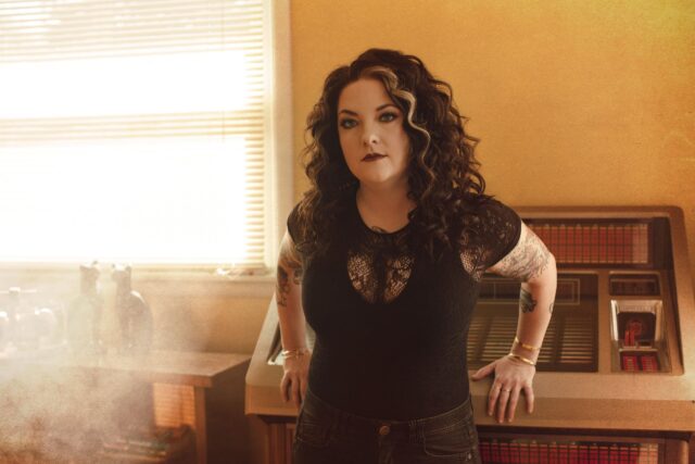Ashley McBryde Elegant Look In Stylish Black Outfit Wallpaper