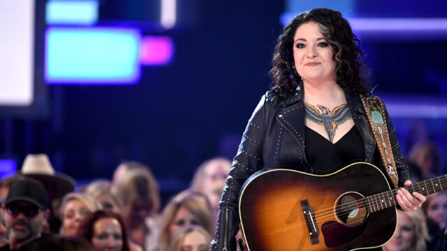 Ashley McBryde Performing Live On Stage Wallpaper