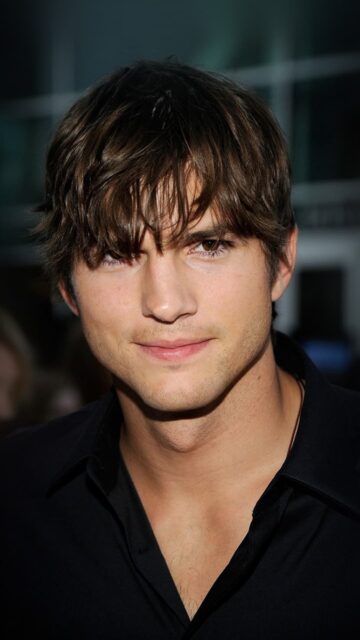 Ashton Kutcher Close Up Portrait Wallpaper With Casual Dark Shirt And Tousled Hair