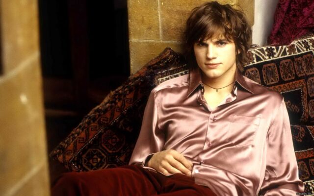 Ashton Kutcher Relaxing In Satin Shirt Vintage Style Wallpaper