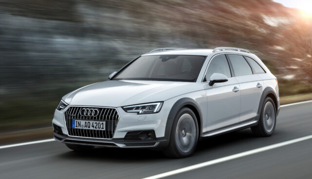 Audi A4 Allroad In Motion Captivating Road Trip Wallpaper